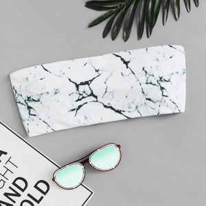 New white marble bandeau top with black bottoms